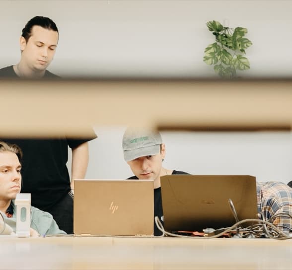 Someone deep in a piece of work at their laptop